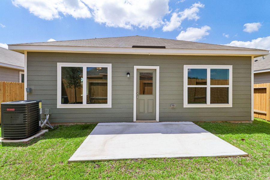 Exterior details and patio area of a home in Magnolia Woods, Magnolia (Image 3).
