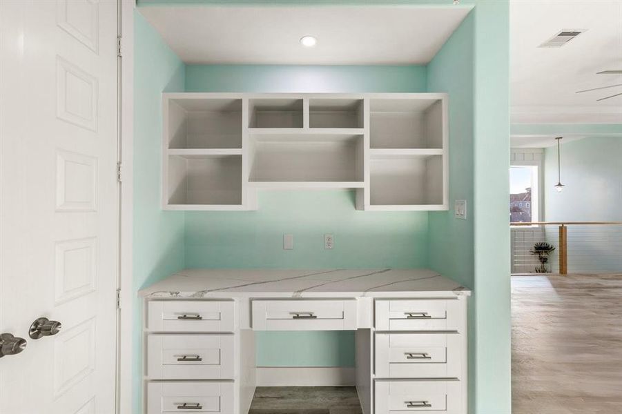 There are several custom-built desk areas. There are several custom-built desk areas.