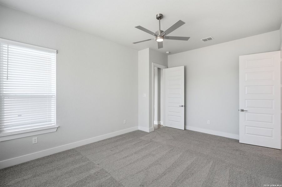 Spacious, unfurnished interior of a new home in Potranco Oaks, Castroville (Image 33).
