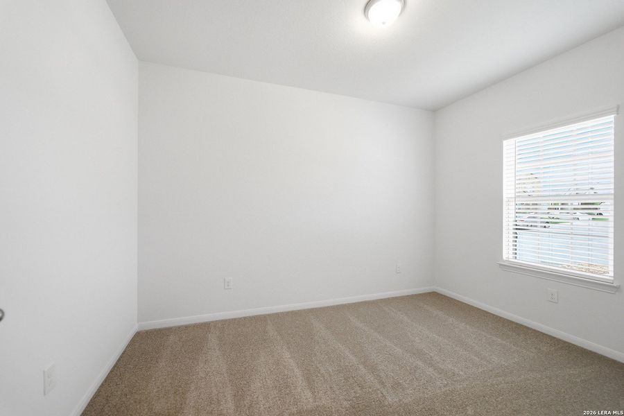 Spacious, unfurnished interior of a new home in Hennersby Hollow, San Antonio (Image 18).