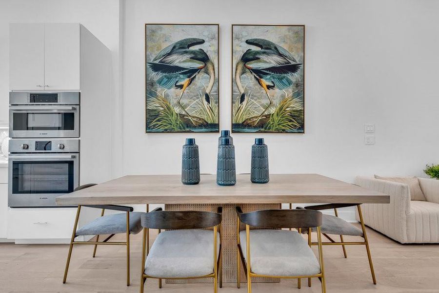 Dining area between living and kitchen areas.  Similar plan.