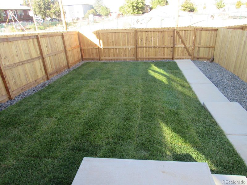 Exterior details and patio area of a home in , Aurora (Image 16).
