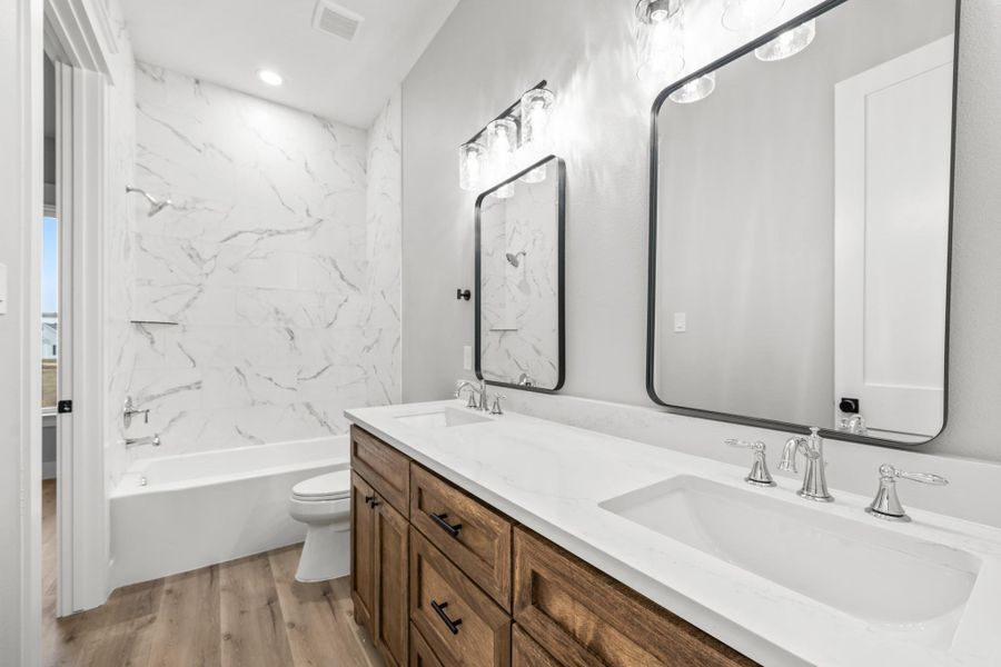 Furnished interior view inside a new home in , New Waverly (Image 11).