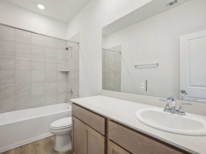 Furnished interior view inside a new home in Prairie Winds - Reserve Collection, Hutto (Image 5).