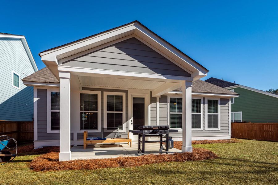 Exterior details and patio area of a home in High Point at Foxbank, Moncks Corner (Image 3).