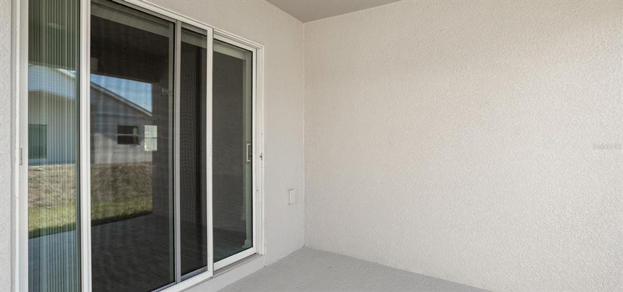 Exterior details and patio area of a home in VillaMar, Winter Haven (Image 2).