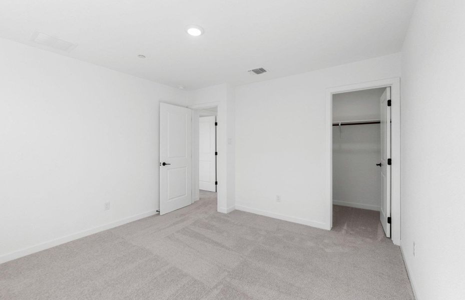 Spacious, unfurnished interior of a new home in Monarch on Main, Round Rock (Image 26).