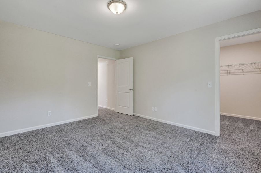 Representative unfurnished interior of a home built from the The Stonecrest by Smith Family Homes in Ramsey Landing, Rincon (Image 36).