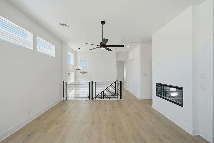 Representative unfurnished interior of a home built from the Athena by Chesmar Homes in Prominence Urban, San Antonio (Image 30).