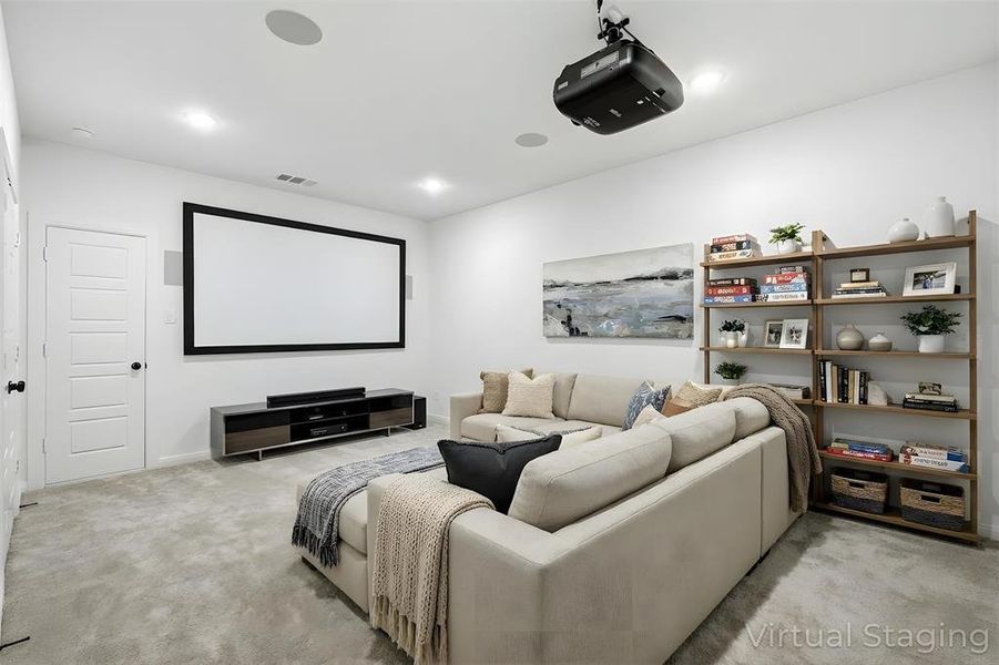 Home theater room with light carpet and recessed lighting Home theater room with light carpet and recessed lighting