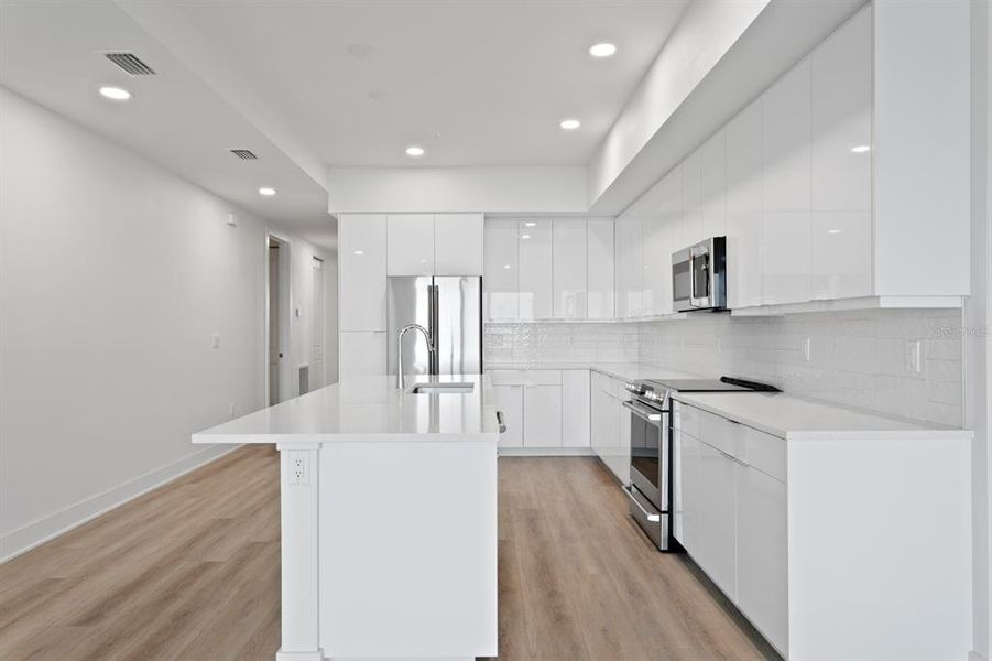 Furnished interior view inside a new home in Residences at Town Center, Madeira Beach (Image 36).