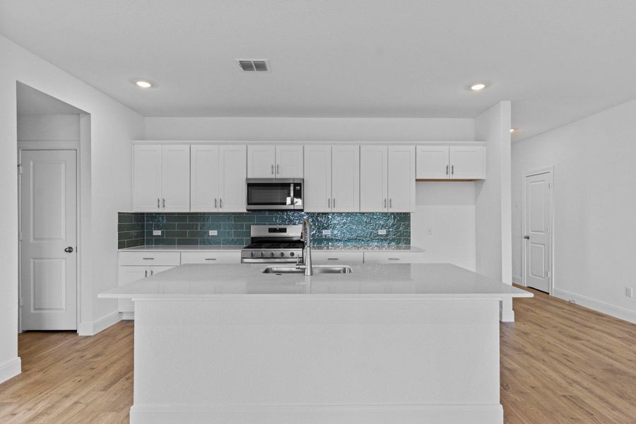 Furnished interior view inside a new home in Railhead, Cedar Creek (Image 14).