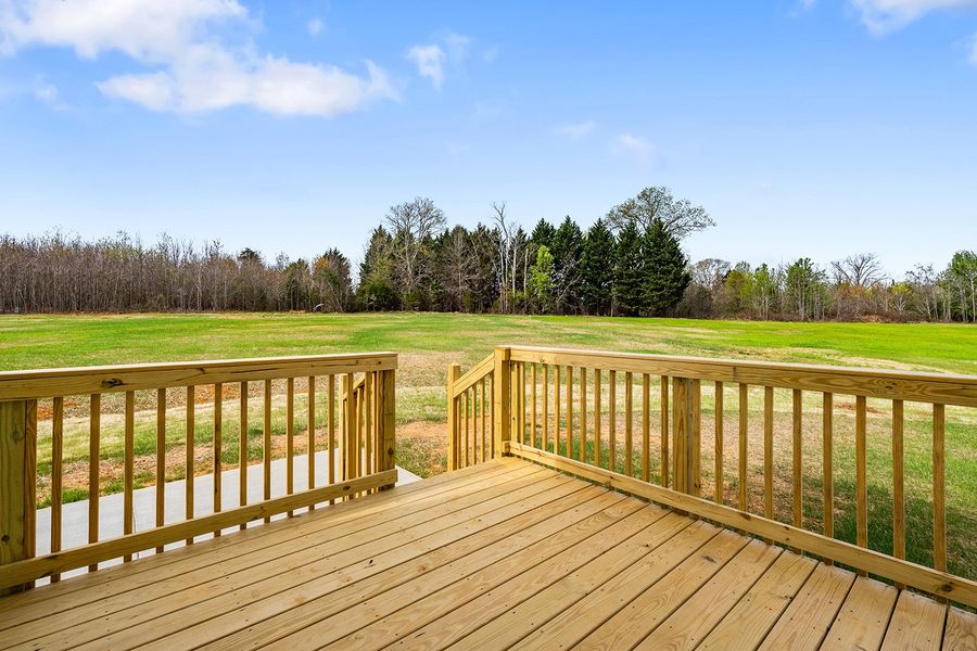 Exterior details and patio area of a home in Lilah Grove, Summerfield (Image 3).