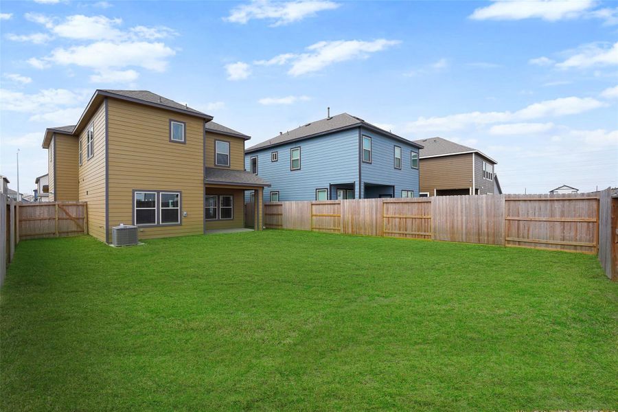 Exterior details and patio area of a home in Glendale Lakes, Arcola (Image 26).