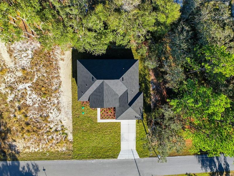 Front exterior of a new home in , Citrus Springs, FL, highlighting curb appeal (Image 29).