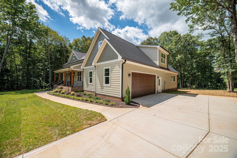 Front exterior of a new home in , Lincolnton, NC, highlighting curb appeal (Image 2).