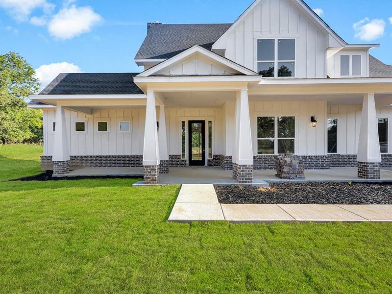 Front exterior of a new home in , Sunset, TX, highlighting curb appeal (Image 21). Front exterior of a new home in , Sunset, TX, highlighting curb appeal (Image 21).