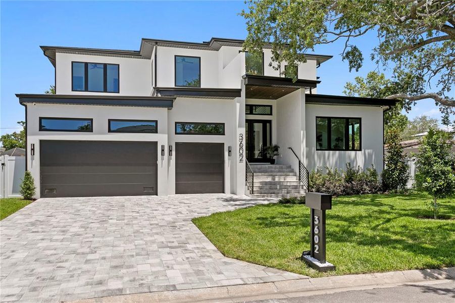 Front exterior of a new home in , Tampa, FL, highlighting curb appeal (Image 2). Front exterior of a new home in , Tampa, FL, highlighting curb appeal (Image 2).