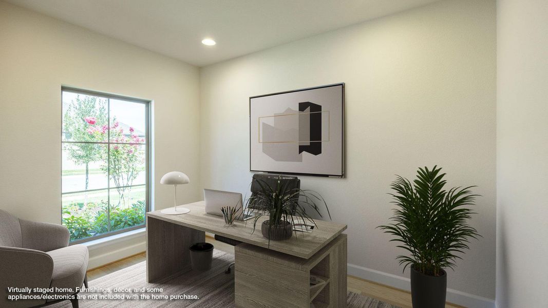 Office with light wood-style floors and recessed lighting