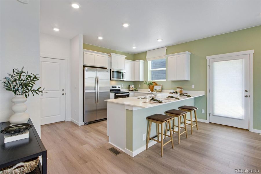 Furnished interior view inside a new home in Settlers Crossing, Commerce City (Image 12).