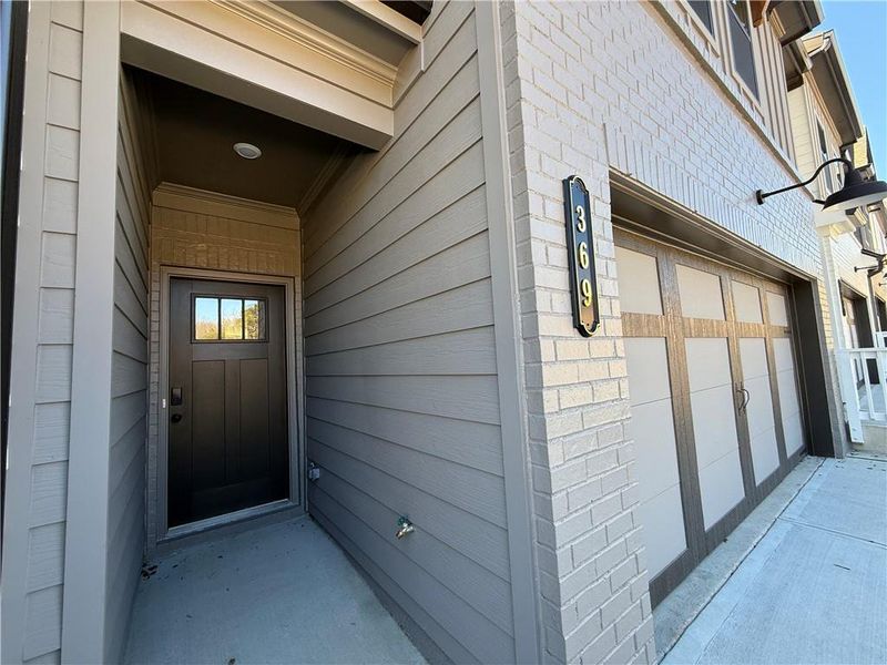 Exterior details and patio area of a home in The Towns at Auburn Station East, Auburn (Image 3).