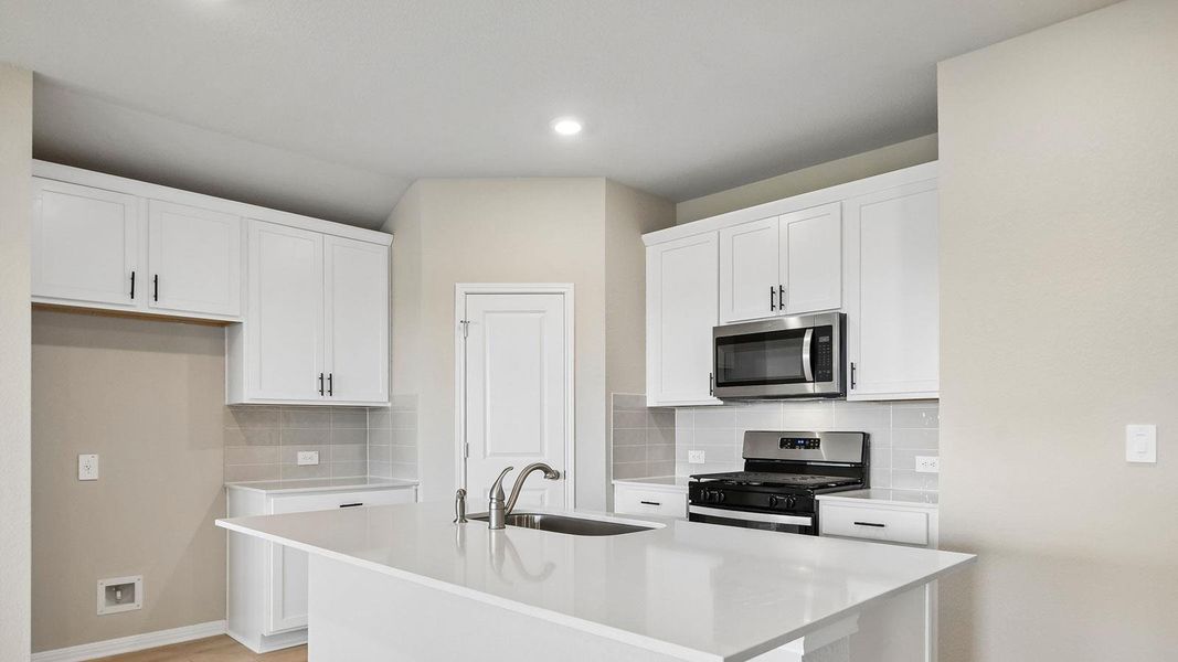 Furnished interior view inside a new home in Carillon, Manor (Image 5).