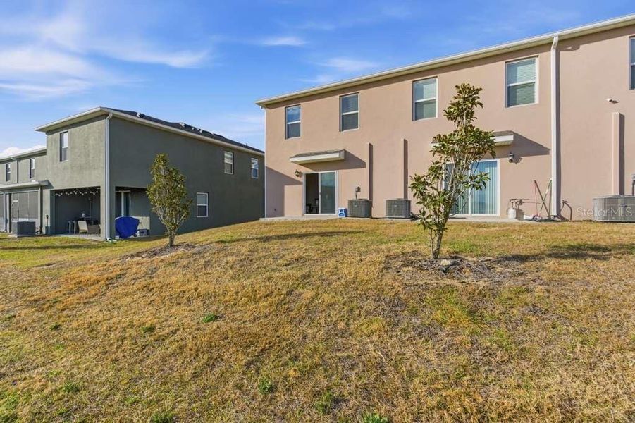 Exterior details and patio area of a home in Brentwood, Davenport (Image 28).