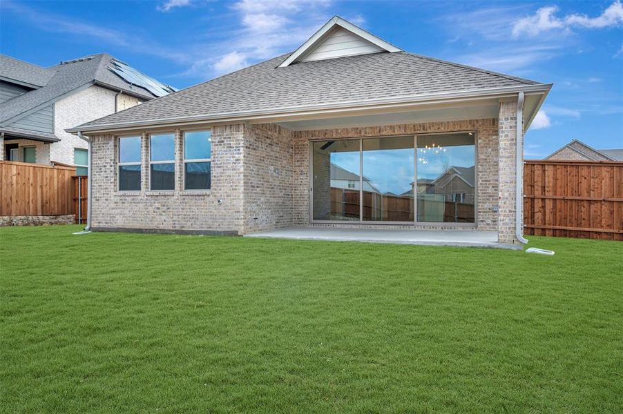 Exterior details and patio area of a home in Gateway Parks, Forney (Image 22).