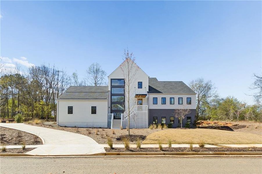 Front exterior of a new home in , Roswell, GA, highlighting curb appeal (Image 26).