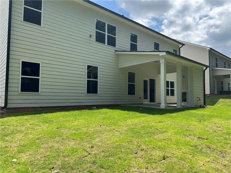 Front exterior of a new home in Rosewood Lake Estates, Hoschton, GA, highlighting curb appeal (Image 28).