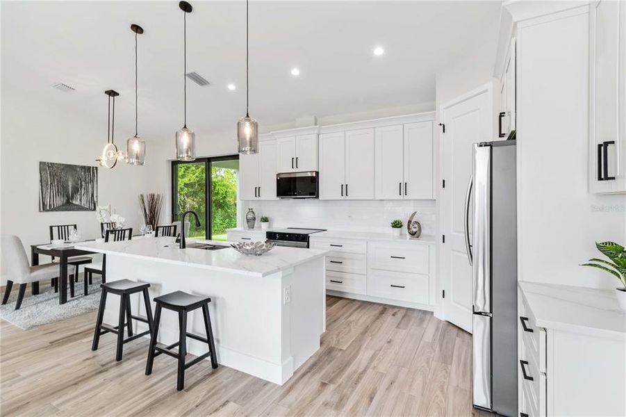 Furnished interior view inside a new home in , North Port (Image 11).