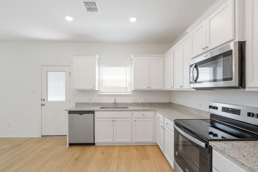 Furnished interior view inside a new home in Canyon Ranch, Jarrell (Image 5).