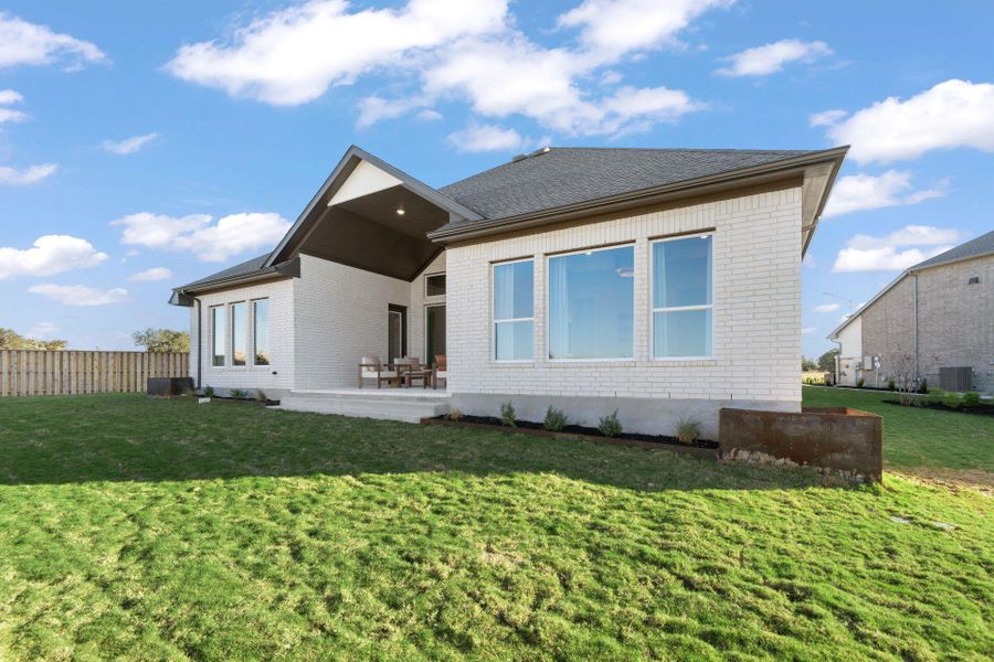 Exterior details and patio area of a home in Parmer Ranch, Georgetown (Image 3). Exterior details and patio area of a home in Parmer Ranch, Georgetown (Image 3).