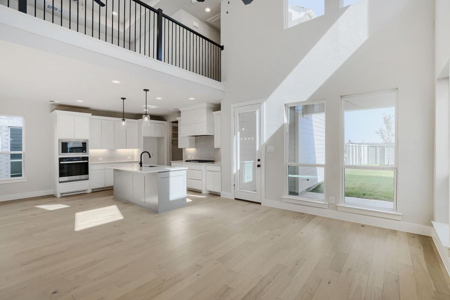 Plan 1604 Representative Photo of Open Concept | Living Area, Dining Area, Kitchen Plan 1604 Representative Photo of Open Concept | Living Area, Dining Area, Kitchen
