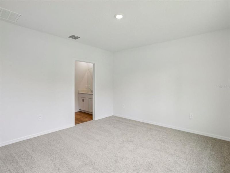 Spacious, unfurnished interior of a new home in Coasterra - Premier Series, Palmetto (Image 17). Spacious, unfurnished interior of a new home in Coasterra - Premier Series, Palmetto (Image 17).