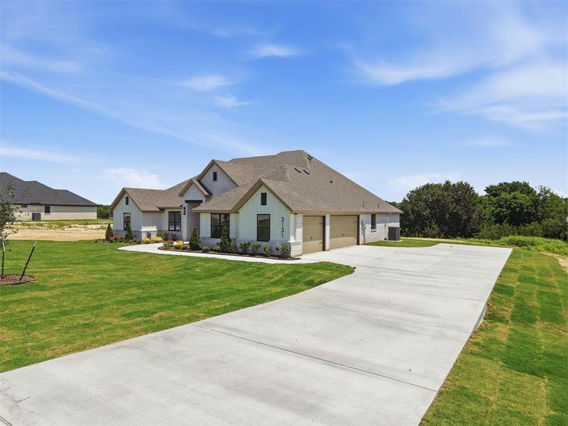 Front exterior of a new home in , Weatherford, TX, highlighting curb appeal (Image 24).