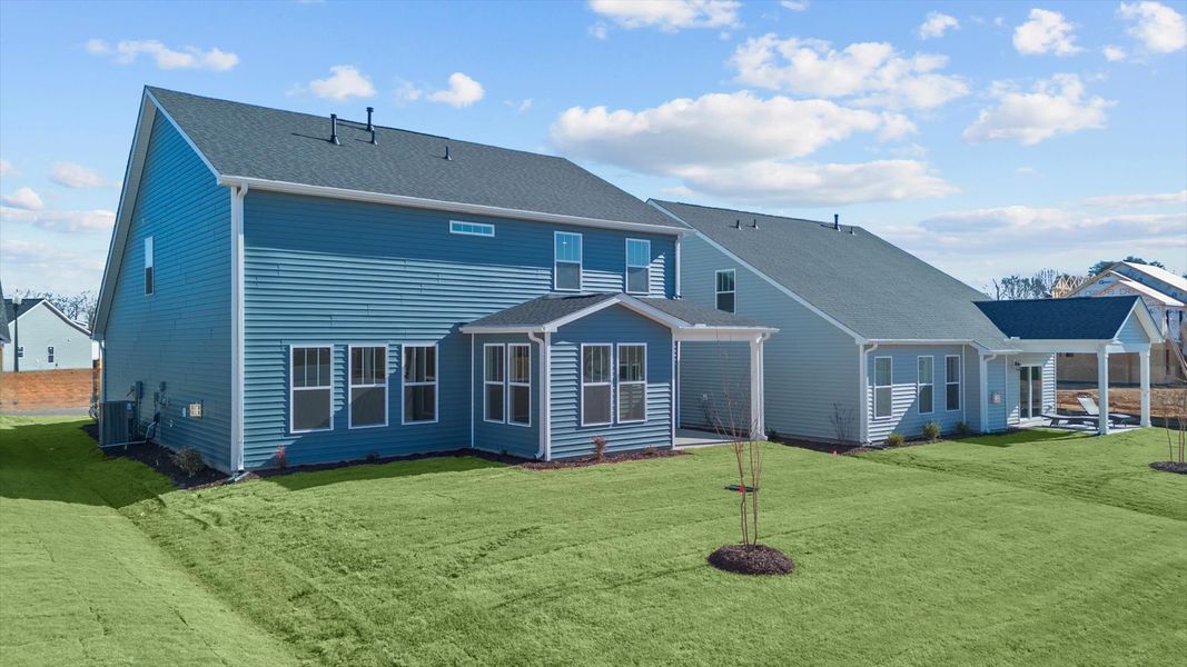 Exceptional outdoor living begins with a covered back porch in this thoughtfully designed home Exceptional outdoor living begins with a covered back porch in this thoughtfully designed home