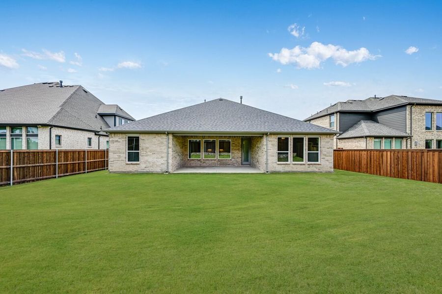 Front exterior of a new home in The Ridge at Northlake 60s, Northlake, TX, highlighting curb appeal (Image 2).