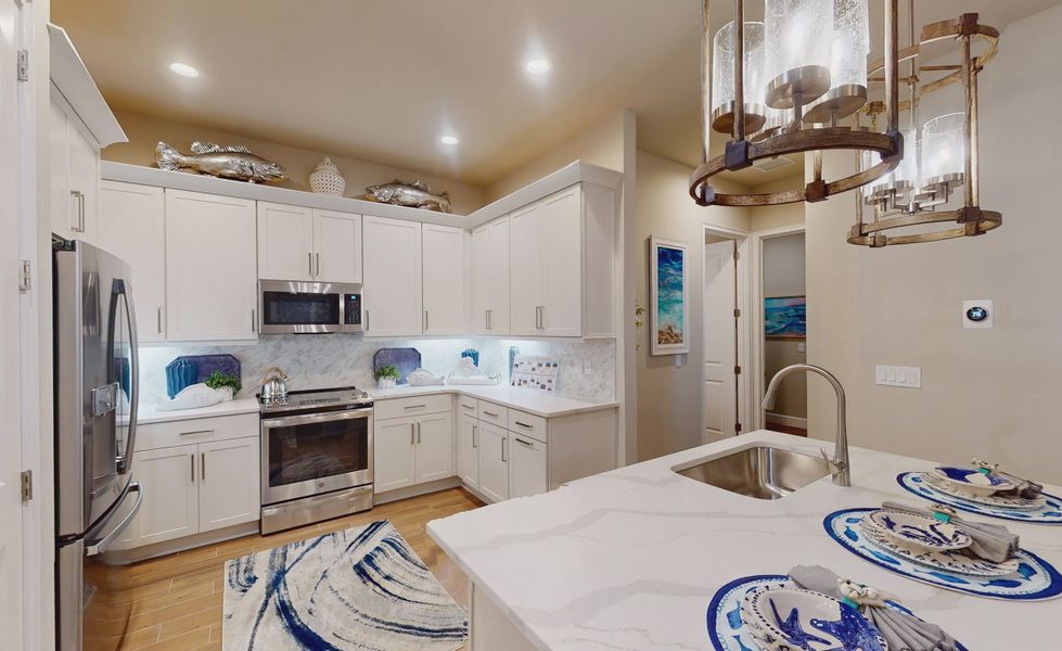 Furnished interior view inside a new home in Plantation Bay, Ormond Beach (Image 8).