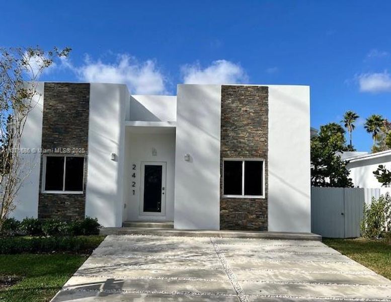 Front exterior of a new home in , Fort Lauderdale, FL, highlighting curb appeal (Image 14).