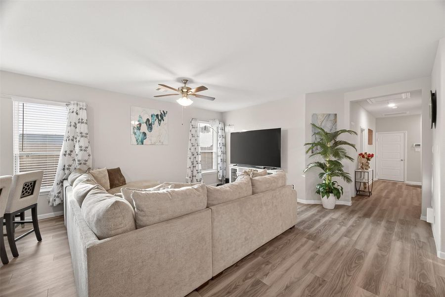 Furnished interior view inside a new home in Sunterra, Katy (Image 7).