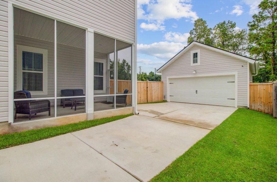Front exterior of a new home in Limehouse Village: Row Collection, Summerville, SC, highlighting curb appeal (Image 30).