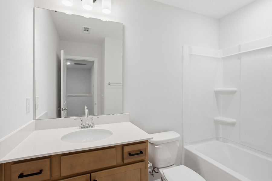 Furnished interior view inside a new home in Renaissance at White Oak, Garner (Image 15).