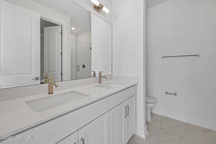 Furnished interior view inside a new home in North Beach Townhomes, Jacksonville Beach (Image 10).