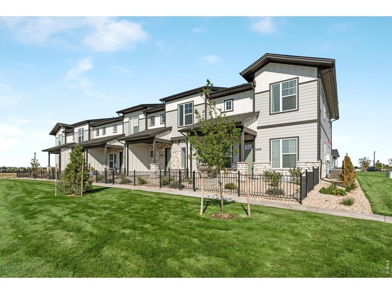 Front exterior of a new home in , Timnath, CO, highlighting curb appeal (Image 1). Front exterior of a new home in , Timnath, CO, highlighting curb appeal (Image 1).