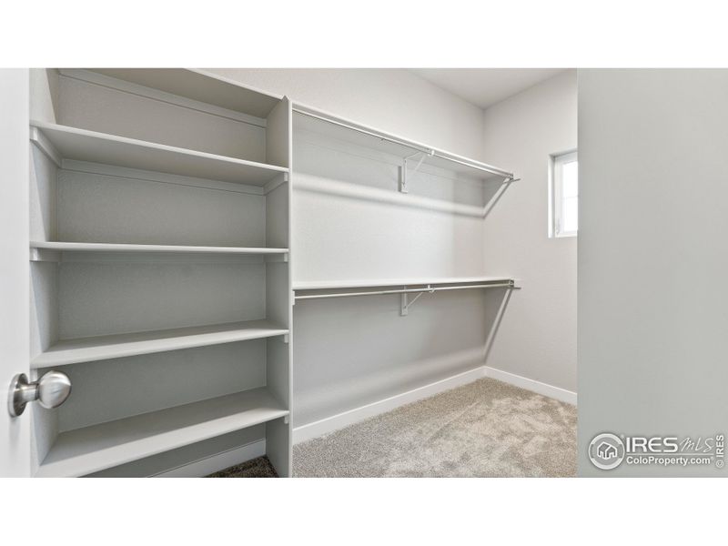 Primary Closet - photos not of actual unit - finishes may vary