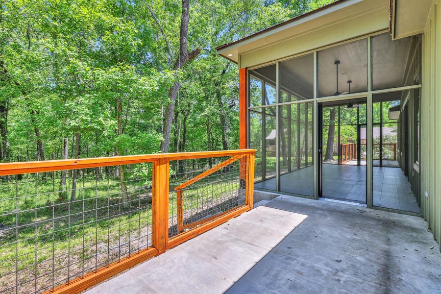 Primary Patio leading to screened in porch