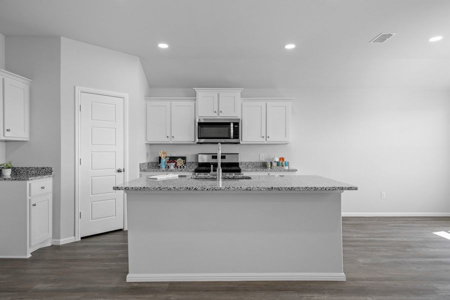 Representative furnished interior of a home built from the BELLVUE by D.R. Horton in Faculty Row, Abilene (Image 8).