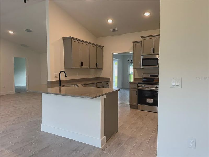 Furnished interior view inside a new home in North Port, North Port (Image 3).