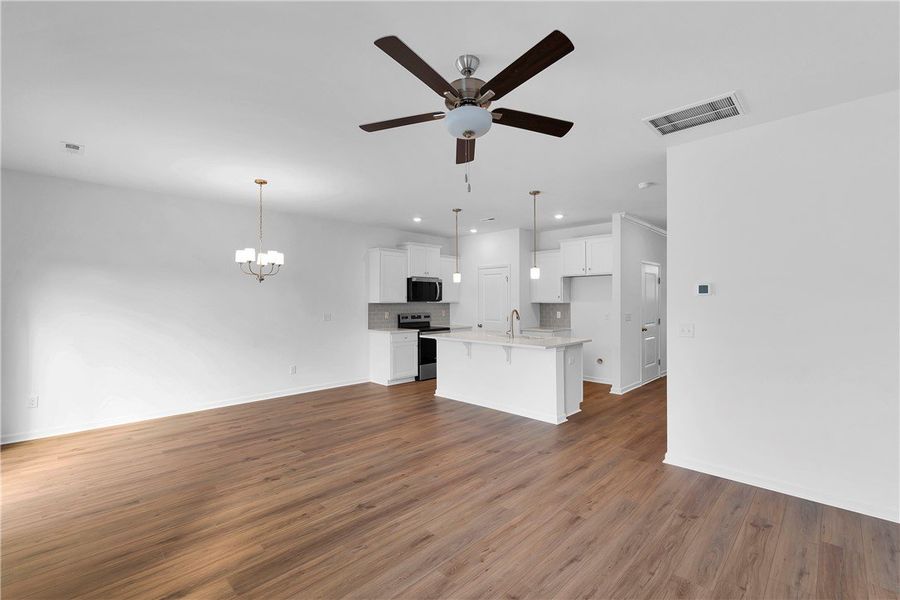 Bright open-concept living space with kitchen and